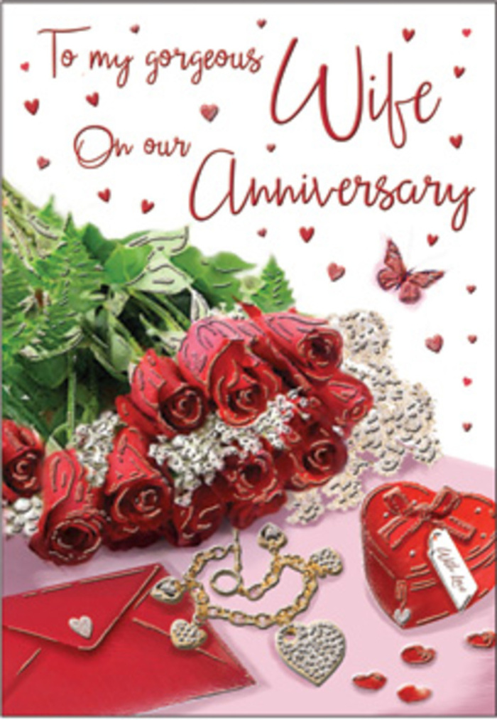 This anniversary card design is presented like a rich, romantic tableau, echoing the thoughtful warmth of celebrations in Great Bookham. At the centre, a bouquet of classic red roses commands attention, each bloom luxuriously full and gently cupped, with velvety petals layered in deep, passionate tones. The roses are elegantly wrapped, their stems hidden beneath folds of soft material that drape like fine fabric on a gift table. Around them, lush green foliage curls and fans outward, heightening the sense of natural abundance in the way that the trees gather along the edges of Bookham High Street. Whisper-fine lace details and delicate heart motifs are scattered across the scene, their textures alternately sheer and embossed, providing visual rhythm. Nearby, a coordinated jewellery set and a vivid red box hint at treasured anniversary gifts - perhaps chosen earlier that day at a local shop, then carefully placed beside the card. The red box gleams with a subtle sheen, while the jewellery pieces reflect warm highlights, suggesting polished metal and smooth stones that rest easily against the skin. The scripted message on the card is elegantly lettered, its flow echoing the curves of the roses and the soft lines of the lace. Hints of velvet, gold, and silk are suggested through the surfaces and finishes, creating a tactile richness you can almost feel beneath your fingertips. The overall atmosphere is unabashedly romantic, the kind of scene you might imagine set out on a bedside table after a special meal at home. It captures not just an anniversary, but the comfort of long-lasting love rooted in familiar Great Bookham surroundings.